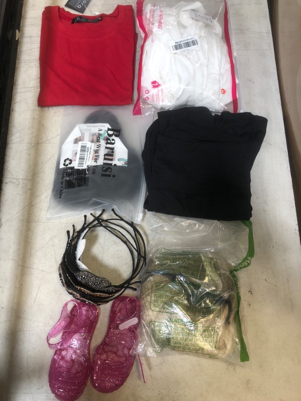 Photo 1 of MISCELLANEOUS BAG LOT - VARIOUS WOMENS CLOTHES AND WIGS - NEW AND USED - SOLD AS IS