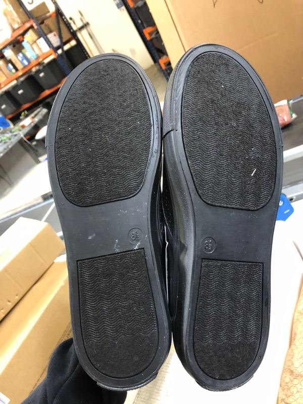 Photo 1 of black slip on shoes size 8.5