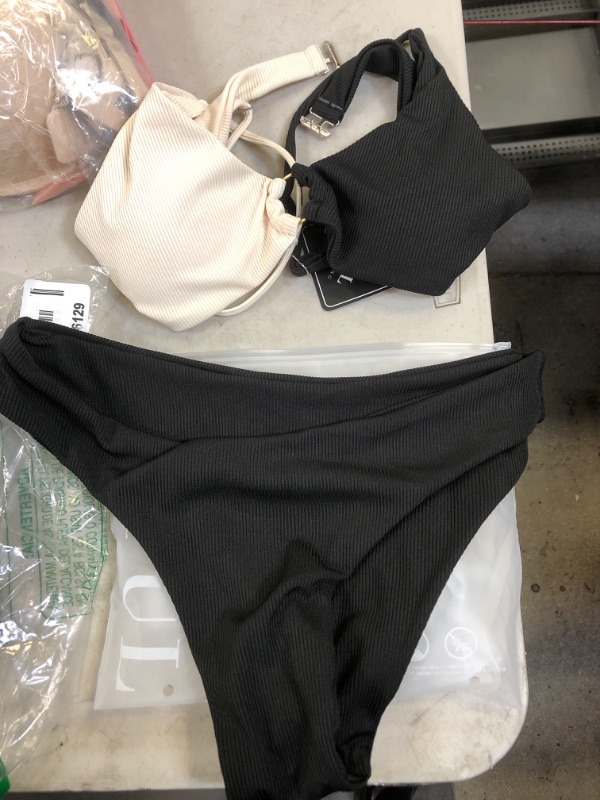 Photo 1 of 2 piece bathing suit size med 