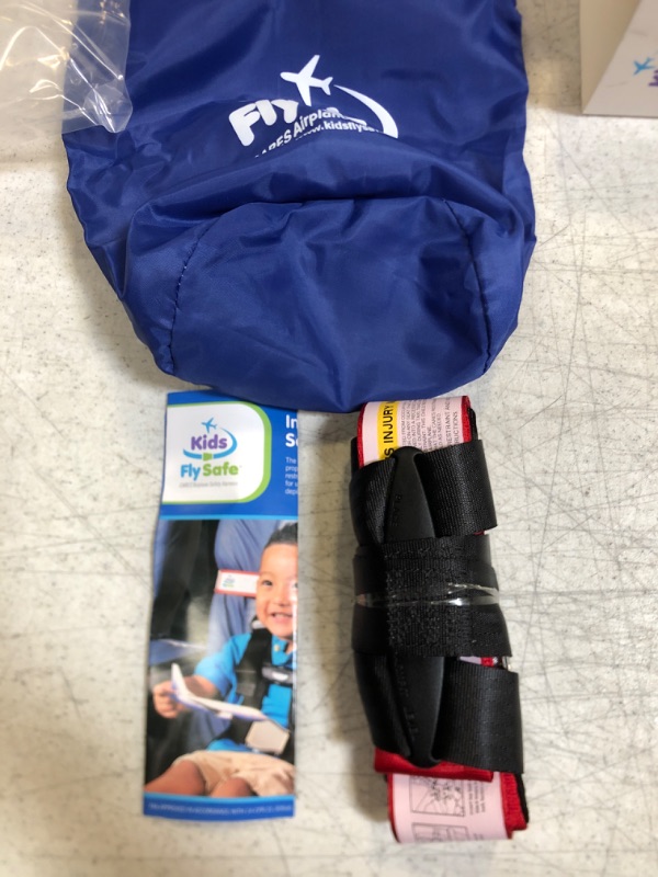 Photo 2 of Cares FAA Approved Airplane Harness for Kids - Toddler Travel Restraint Seat Belt - Provides Car Seat Safety for Children on Flights - Light Weight, Easy to Store and Installs in Minutes.