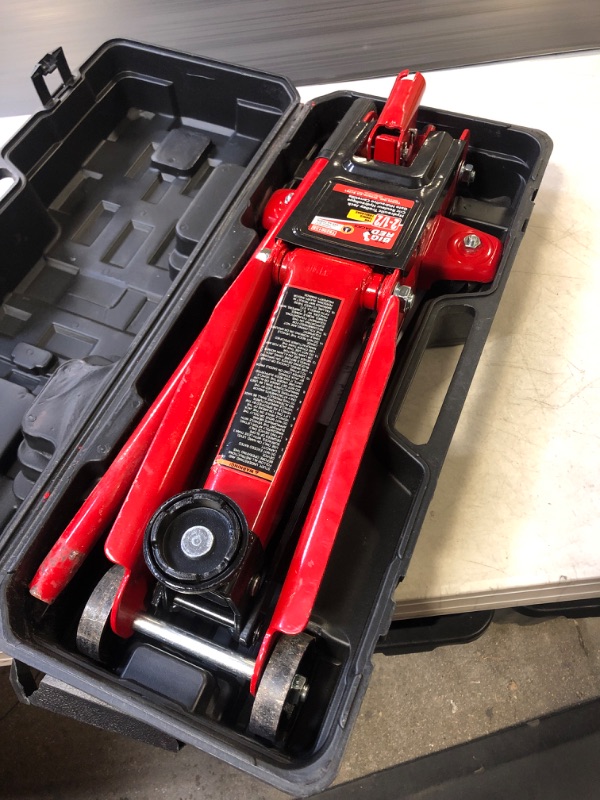 Photo 2 of BIG RED TAM825013S Torin Hydraulic Trolley Floor Service/Floor Jack with Blow Mold Carrying Storage Case, 2.5 Ton (5,000 lb) Capacity, Red 2.5 Ton with Storage Case