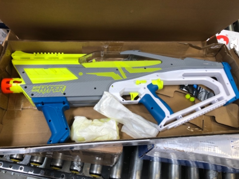 Photo 1 of NERF Hyper Evolve-100 Blaster, Hyper Rounds, Spring-Open Instant Reload Hopper, Up to 110 FPS Velocity, Eyewear Included