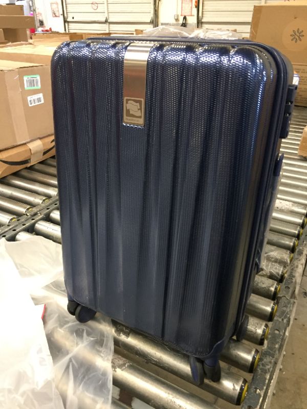 Photo 1 of 21inch blue hardback luggage 