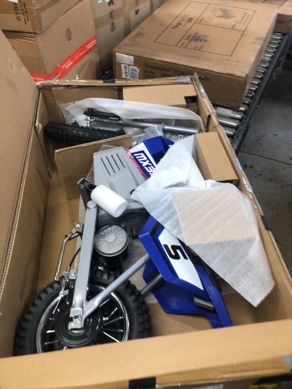 Photo 2 of Razor MX350 Dirt Rocket Electric Motocross Off-road Bike for Age 13+, Up to 30 Minutes Continuous Ride Time, 12" Air-filled Tires, Hand-operated Rear Brake, Twist Grip Throttle, Chain-driven Motor Mx350 - Blue
