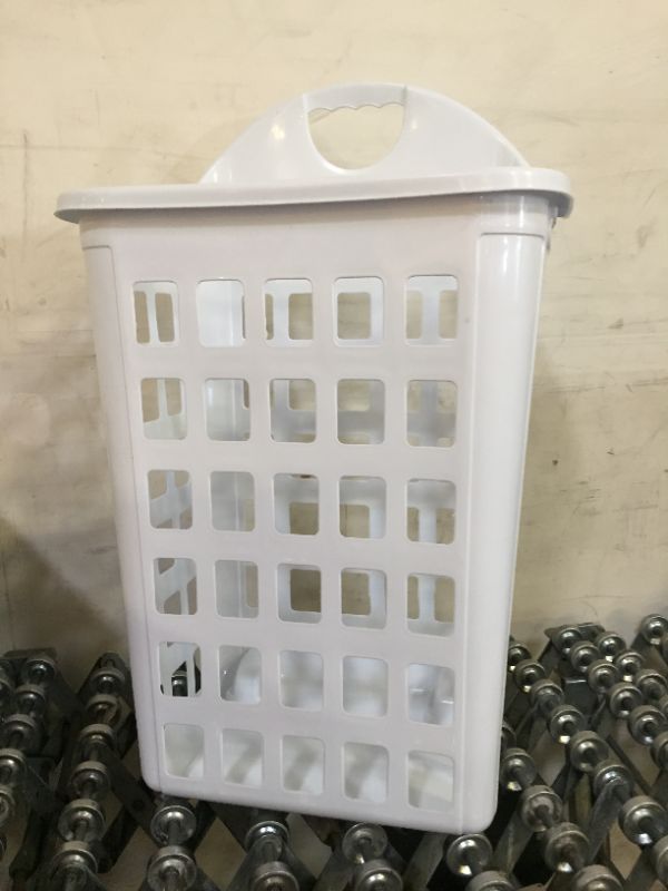 Photo 1 of WHITE LAUNDRY BASKET