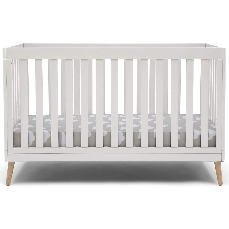 Photo 1 of 
Delta Children Essex 4-in-1 Convertible Baby Crib, Bianca White with Natural Legs
Style:Crib
Color:Bianca White