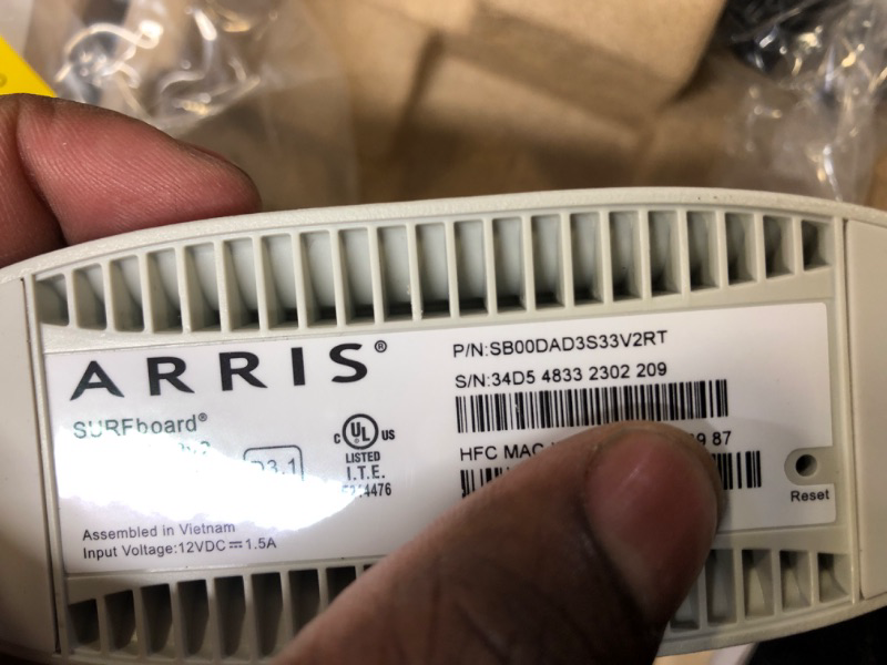 Photo 3 of ARRIS Surfboard S33 DOCSIS 3.1 Multi-Gigabit Cable Modem | Approved for Comcast Xfinity, Cox, Spectrum & More | 1 & 2.5 Gbps Ports | 2.5 Gbps Max Internet Speeds | 4 OFDM Channels | 2 Year Warranty DOCSIS 3.1 Modem Only Router System