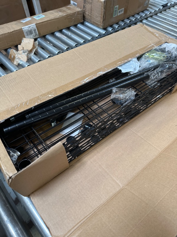 Photo 2 of Amazon Basics 4-Shelf Adjustable, Heavy Duty Storage Shelving Unit (350 lbs loading capacity per shelf), Steel Organizer Wire Rack, Black (36L x 14W x 54H) Black 4-Shelf Storage Unit without Caster