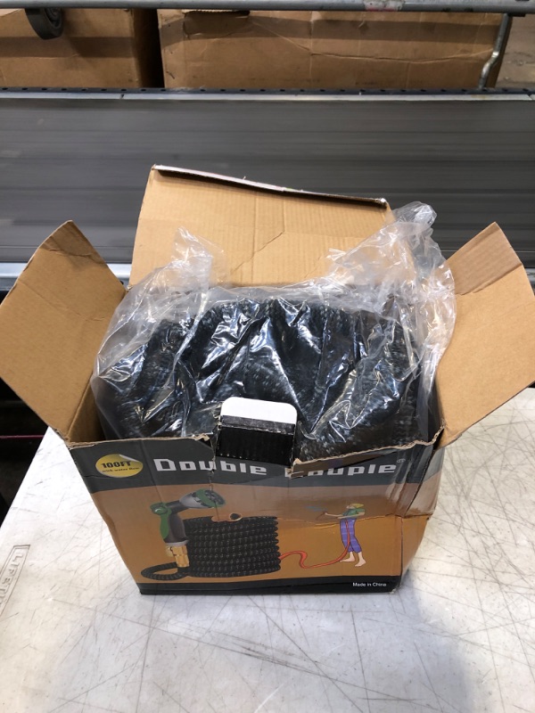 Photo 1 of 100ft Extendable Garden Hose