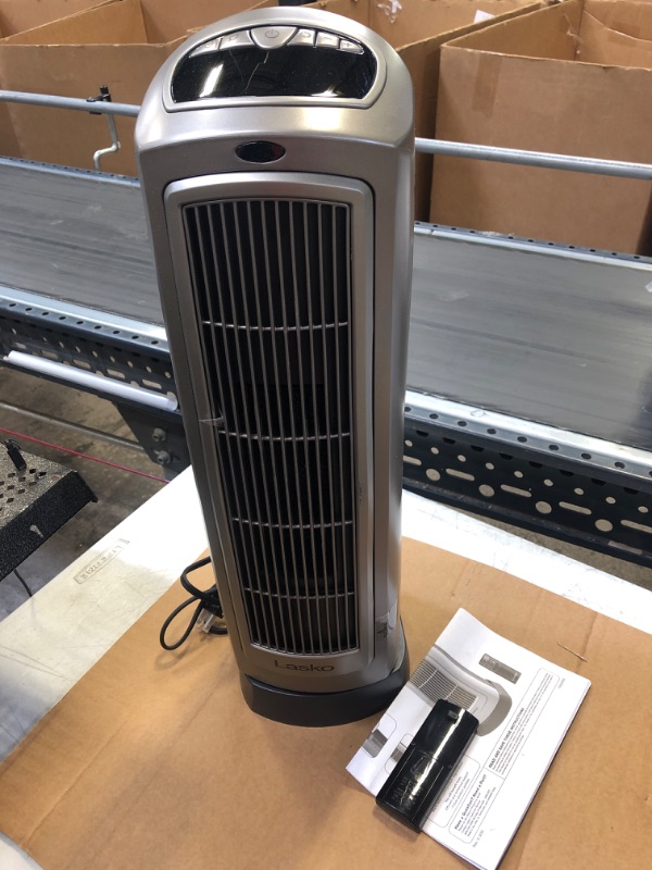 Photo 1 of Lasko 1500W Digital Ceramic Space Heater with Remote, 755320, Silver