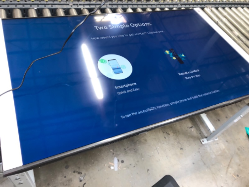 Photo 1 of SAMSUNG 60-Inch Class QLED Q60B Series - 4K UHD Dual LED Quantum HDR Smart TV with Alexa Built-in