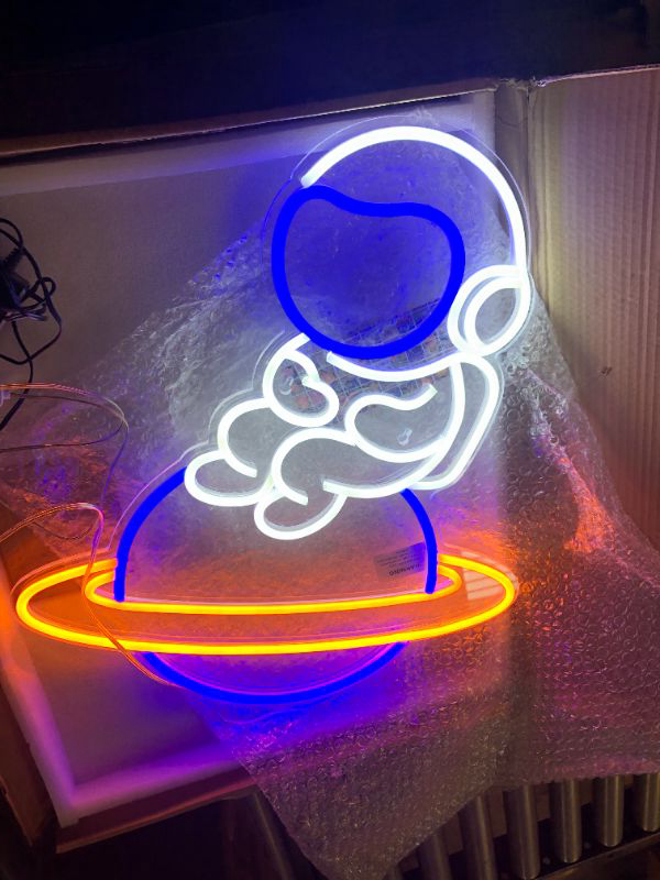 Photo 3 of Astronaut Sitting on Planet LED Neon Sign Big Neon Light Sign 19.7’’ Neon Wall Light for Bedroom, Game Room Decorative Big Astronaut Sign Light Space Man Gift for Kids (Astronaut 12V - Super Bright)