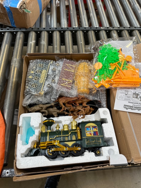 Photo 2 of FANL Train Set Toy with Remote - Upgraded Large Size Electric Train Toy Set with Dinosaurs, Battery-Powered Steam Locomotive Engine, Cargo Cars & Tracks, Gift Toys for Age 3 4 5 6 7 8+ Kids, Assorted 2022 Dinosaur Train Set