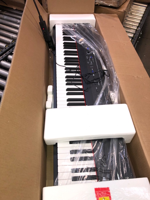 Photo 3 of Alesis Recital – 88 Key Digital Piano Keyboard with Semi Weighted Keys, 2x20W Speakers, 5 Voices, Split, Layer and Lesson Mode, FX and Piano Lessons
