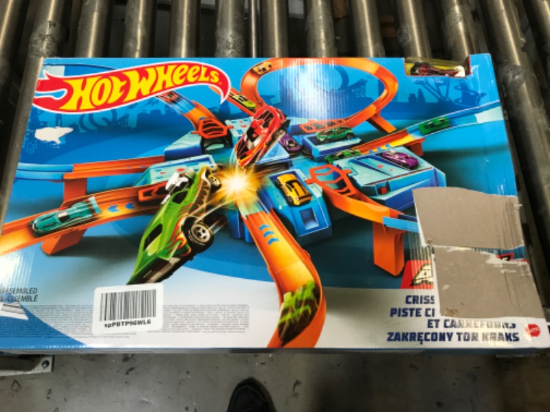 Photo 2 of Hot Wheels Track Set with 1:64 Scale Toy Car, 4 Intersections for Crashing, Powered by a Motorized Booster, Criss-Cross Crash Track????