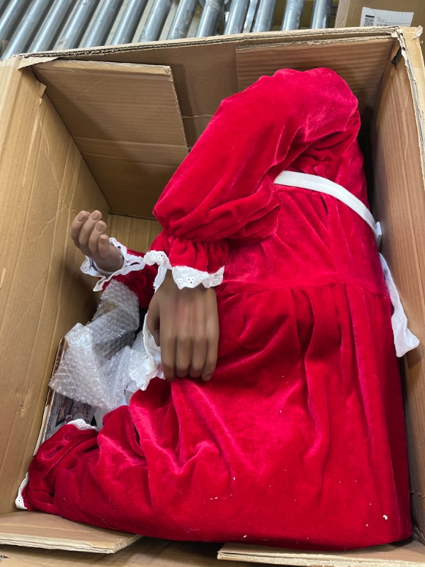 Photo 2 of 58 in. Christmas African American Dancing Mrs. Claus with Apron and Gift Sack
