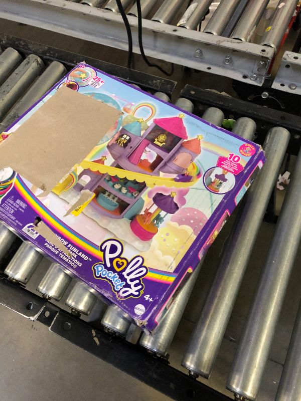 Photo 2 of ?Polly Pocket Rainbow Funland Theme Park, 3 Rides, 7 Play Areas, Polly and Shani Dolls, 2 Unicorns & 25 Surprise Accessories (30 Total Play Pieces), Dispensing Feature for Surprises
