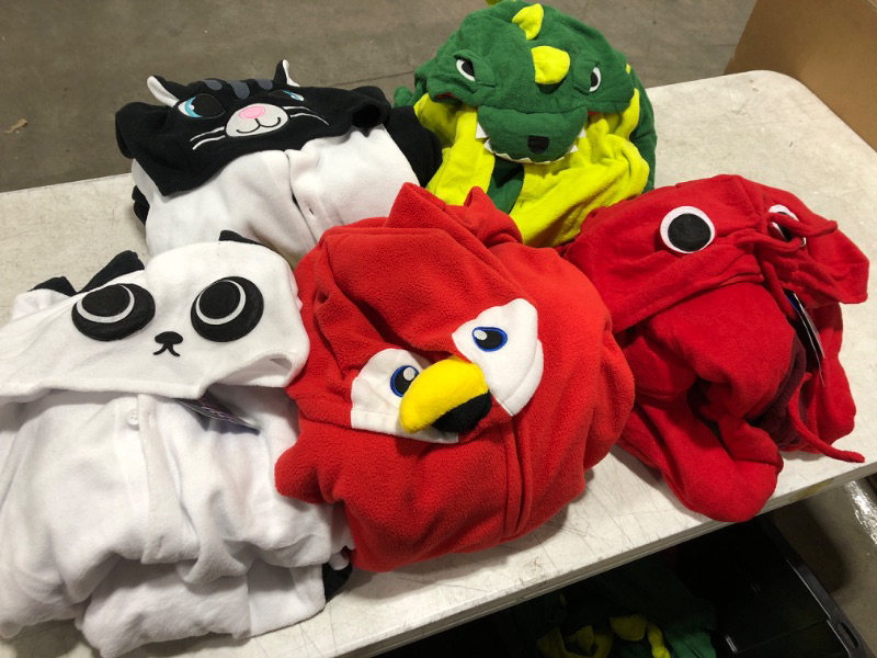 Photo 2 of Box lot of animal onesies in size Large. Can be used for costume or just for lounging!! Lobster, cow, dinosaur, parrot, and cat.