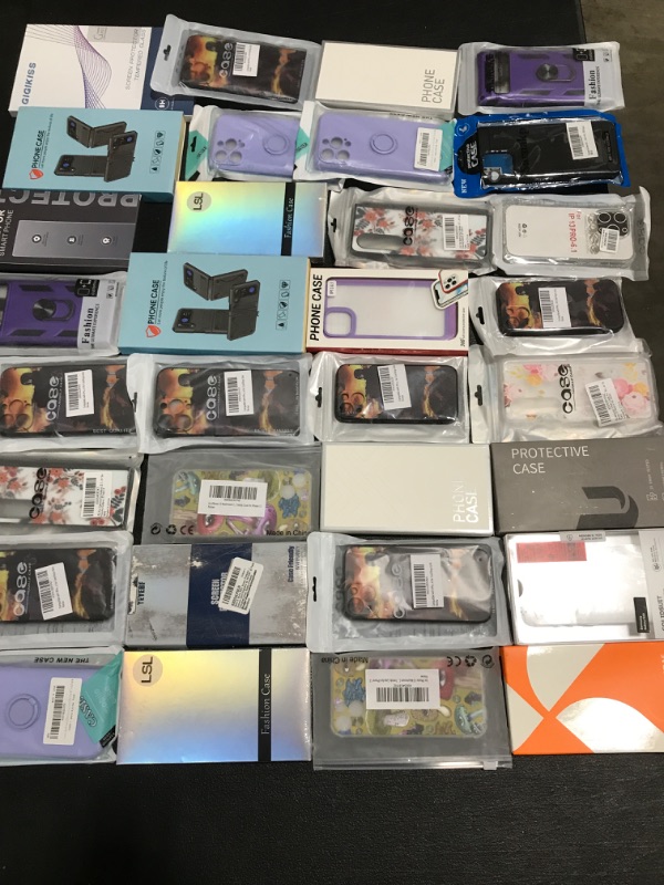 Photo 1 of LOT OF ASSORTED SMARTPHONE CASES & ACCESSORIES. STYLES AND APPLICATIONS VARY. 