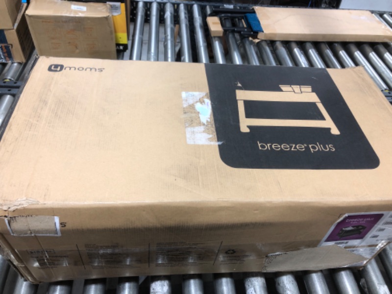 Photo 1 of 4moms Breeze Plus Portable Playard with Removable Bassinet and Baby Changing Station, Easy One-Handed Setup, from The Makers of The mamaRoo