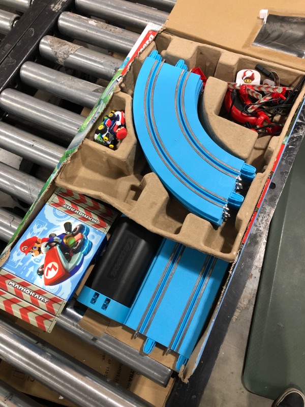 Photo 2 of Carrera First Mario Kart - Slot Car Race Track With Spinners - Includes 2 Cars: Mario and Yoshi - Battery-Powered Beginner Racing Set