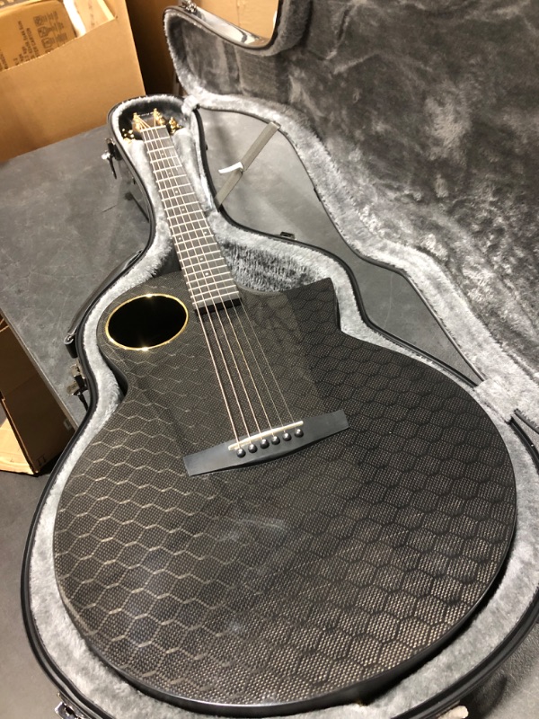 Photo 2 of Enya Carbon Fiber Acoustic Electric Guitar X4 Pro AcousticPlus 41” Cutaway Guitar Bundle with Hard Case, Leather Strap(EA-X4E Pro)