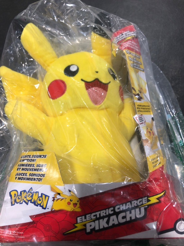 Photo 2 of POKEMON Pikachu Electric Charge - 10 Inch Interactive Plush with Lights, Voice Reactions, and Thunder FX