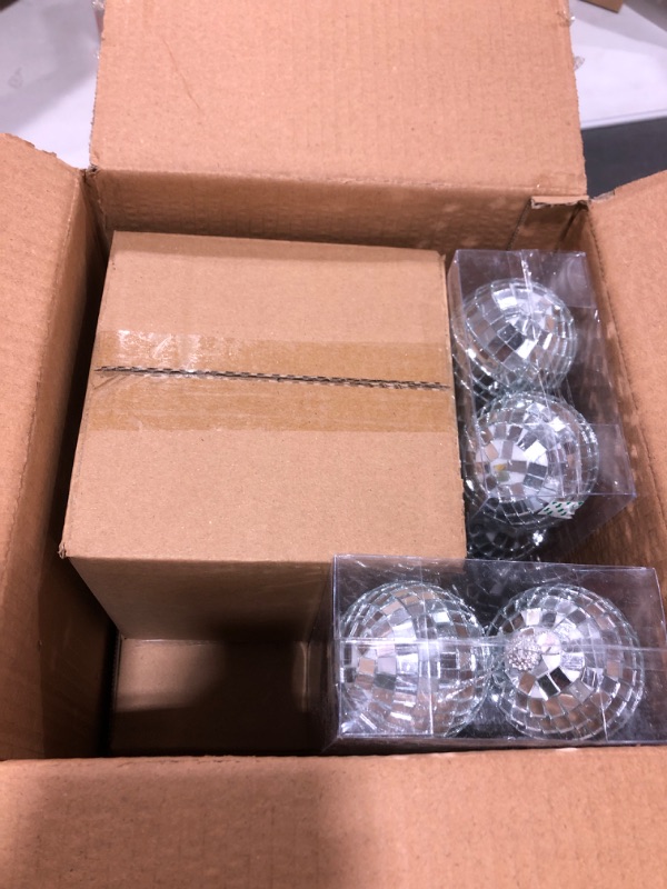 Photo 2 of 14Pcs Hanging Mirror Disco Ball Ornaments,Bright Silver Reflective Disco Ball Free Rotation Disco Ball for Fun Party Home Bands Decorations(8Inch,6Inch,2.5Inch)
