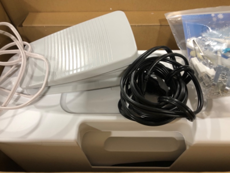 Photo 3 of Brother CS7000X Computerized Sewing and Quilting Machine, 70 Built-in Stitches, LCD Display, Wide Table, 10 Included Feet, White CS7000X Machine