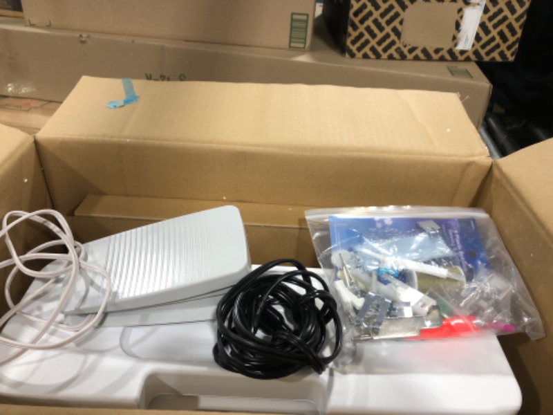 Photo 2 of Brother CS7000X Computerized Sewing and Quilting Machine, 70 Built-in Stitches, LCD Display, Wide Table, 10 Included Feet, White CS7000X Machine