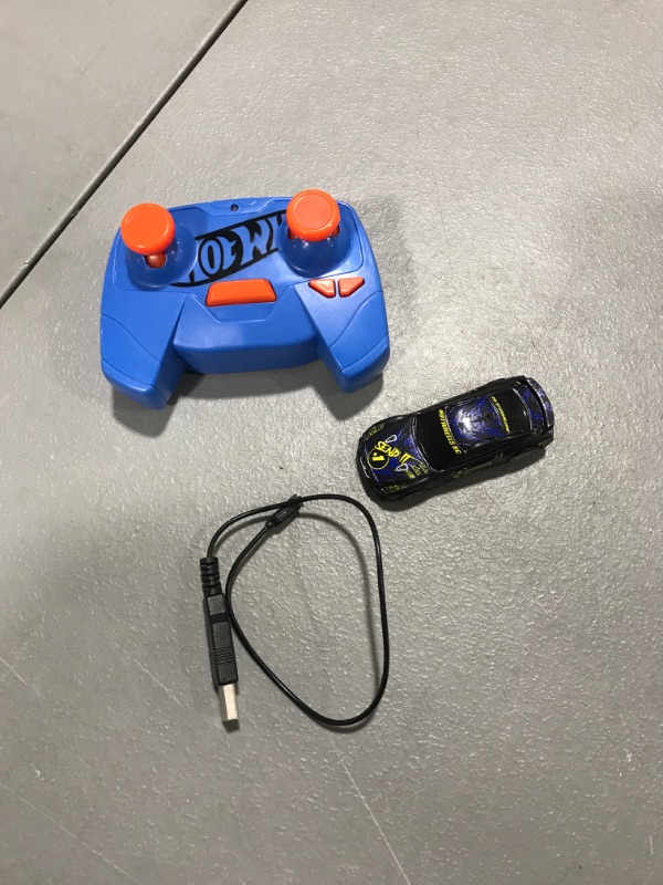 Photo 2 of Hot Wheels RC 1:64 Scale Rechargeable Radio-Controlled Racing Cars For On- Or Off-Track Play, Includes Car, Controller & Adapter For Kids 5 Years Old & Up 2022 Nissan GTR