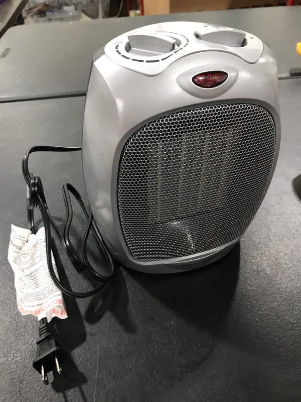 Photo 2 of Amazon Basics 1500W Ceramic Personal Heater with Adjustable Thermostat, Silver
