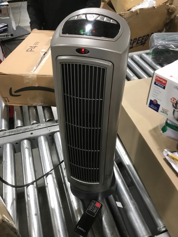 Photo 1 of Lasko Oscillating Digital Ceramic Tower Heater for Home with Adjustable Thermostat, Timer and Remote Control, 23 Inches, 1500W, Silver, 755320