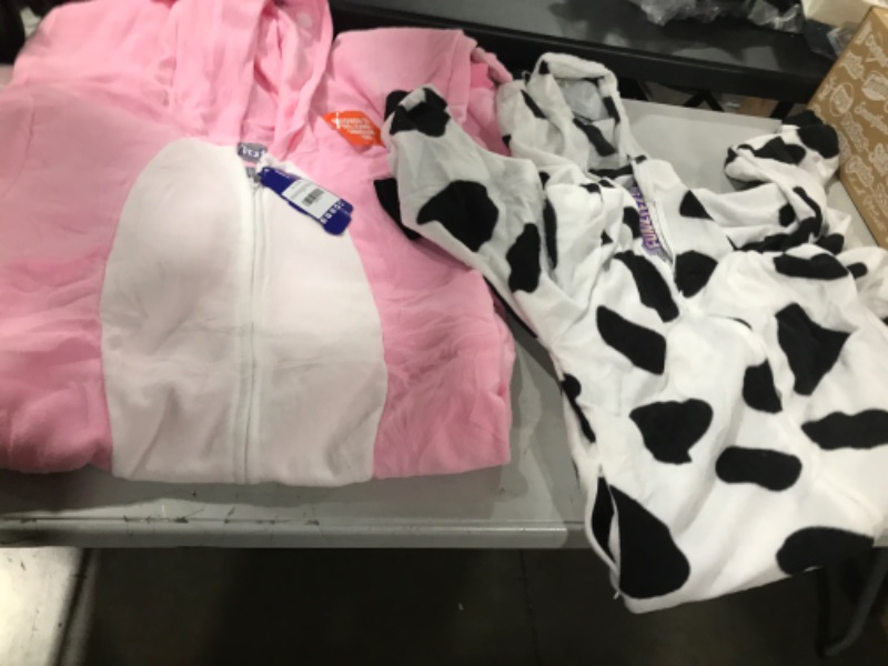 Photo 1 of 2 onesies medium and xs