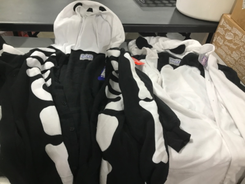 Photo 1 of 2 onesies both large