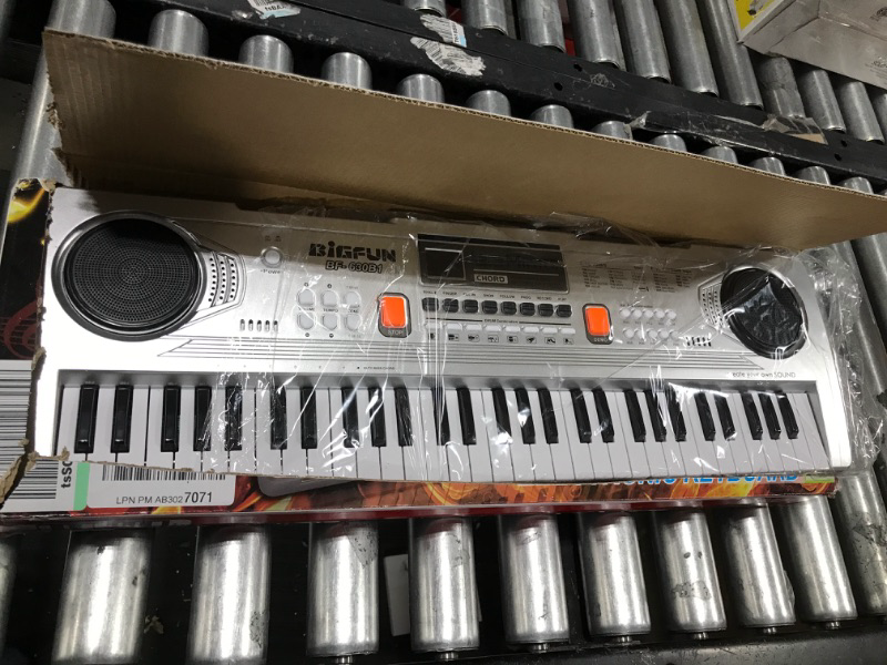 Photo 1 of BIGFUN Keyboard Piano for Kids, 61Key Multifunction Electric Piano Keyboard Educational Instrument Toy for 3 4 5 6 7 8 9 10 11 12 Years Old Boys and Girls with Microphone… 630B1