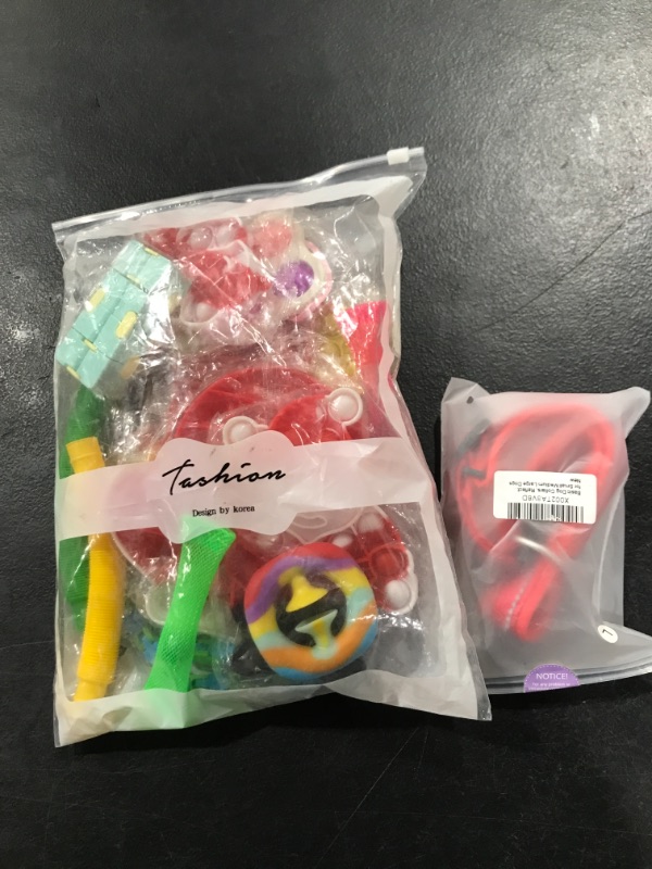 Photo 1 of BUNDLE OF FIDGET TOYS