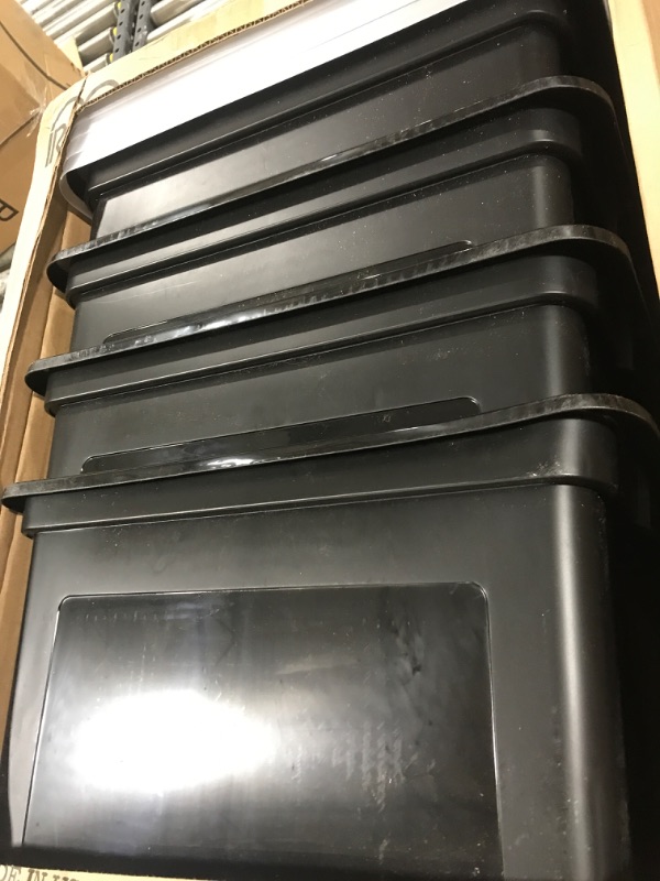 Photo 1 of storage bins
