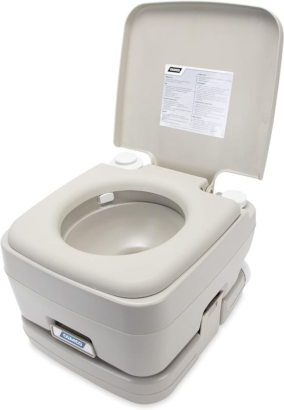 Photo 1 of Camco Portable Travel Toilet | Features Bellow-Type Flush and Sealing Slide Valve to Lock-in Odors 2.6 Gallon (41531),Gray/Beige
