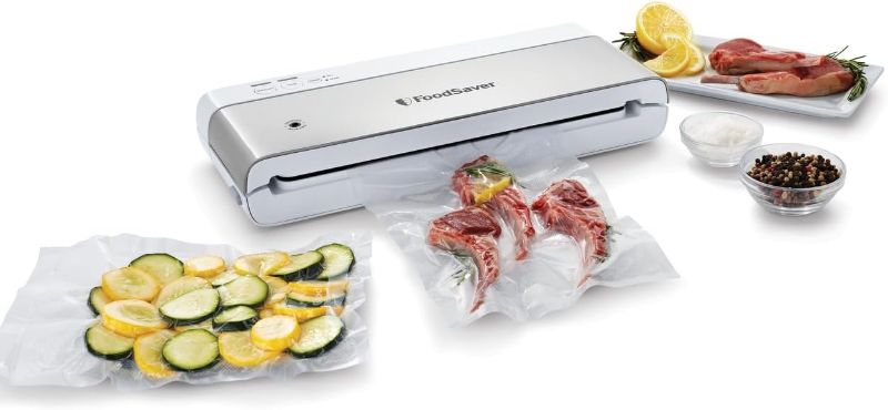 Photo 1 of FoodSaver Compact Vacuum Sealer Machine with Sealer Bags and Roll for Airtight Food Storage and Sous Vide, White