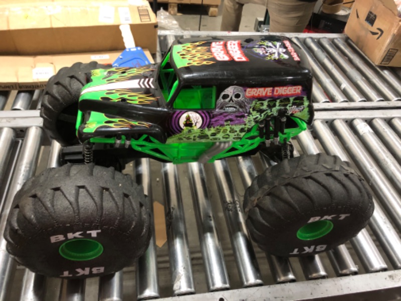 Photo 1 of Monster Jam, Official Mega Grave Digger All-Terrain Remote Control Monster Truck with Lights, 1:6 Scale, Kids Toys for Boys and Girls Ages 4-6+
