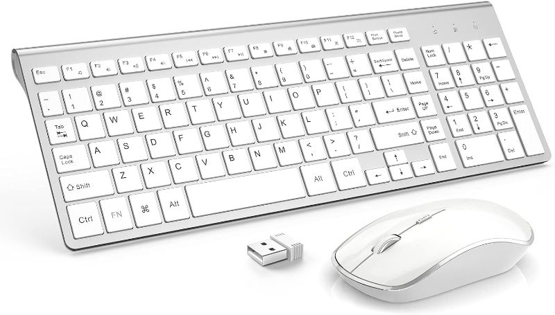 Photo 1 of Wireless Keyboard and Mouse,J JOYACCESS USB Slim Wireless Keyboard Mouse with Numeric Keypad Compatible with iMac Mac PC Laptop Tablet Computer Windows -Silver White
