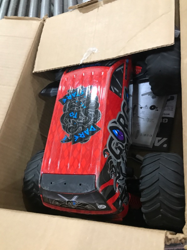 Photo 1 of RED MONSTER TRUCK TOY 