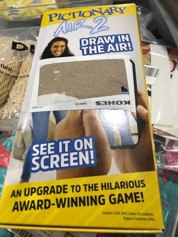 Photo 2 of Pictionary Air 2 Family Game for Kids and Adults with Exclusive Black Color Light Pen & Digital Clue Packs (Amazon Exclusive)