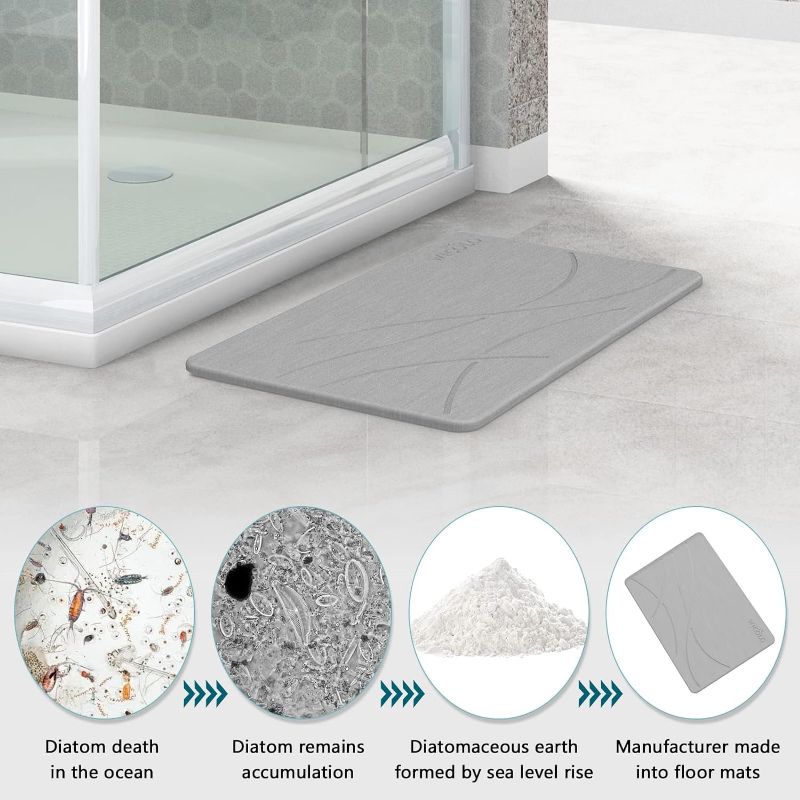 Photo 1 of WICOLO Stone Bath Mat, Diatomaceous Earth Shower Mat Non Slip Instantly Removes Water Drying Fast Bathroom Mat Natural Easy to Clean (23.5*15inch, Light Grey) 23.5*15inch Light Grey