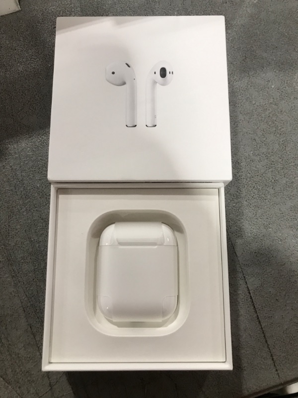 Photo 2 of Apple AirPods (2nd Generation) Wireless Ear Buds, Bluetooth Headphones with Lightning Charging Case Included, Over 24 Hours of Battery Life, Effortless Setup for iPhone
