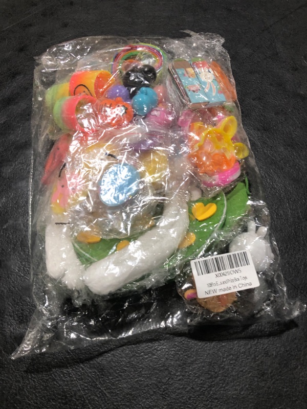 Photo 2 of 108Pcs Easter Basket Stuffers Felt Rabbit Basket with Bunny Ears Headbands, Pull Back Cars, Rainbow Circles, Pop chains and More Perfect Goodie Bag Stuffers for Kids and Prize Box Toys