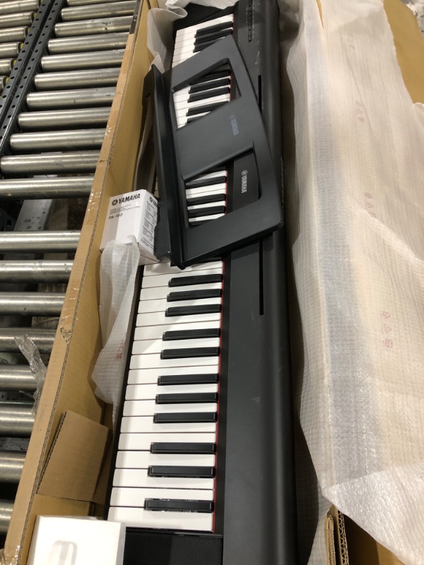 Photo 2 of Yamaha 76-Key Piaggero Ultra-Portable Digital Piano, Black (NP35B) Black 76-Key