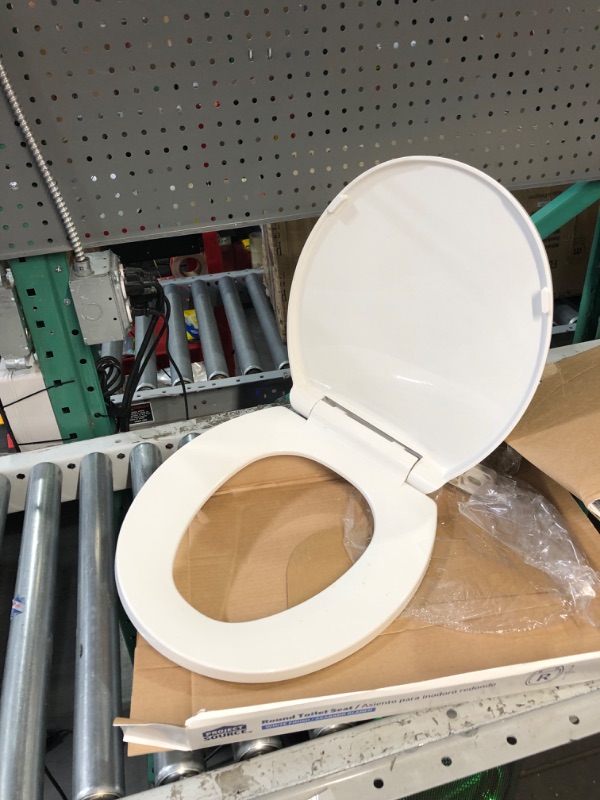 Photo 3 of Project Source Plastic White Round Soft Close Toilet Seat
