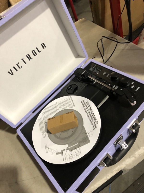 Photo 3 of **The 45 & 33 settings do not work correctly**
Victrola Vintage 3-Speed Bluetooth Portable Suitcase Record Player with Built-in Speakers 